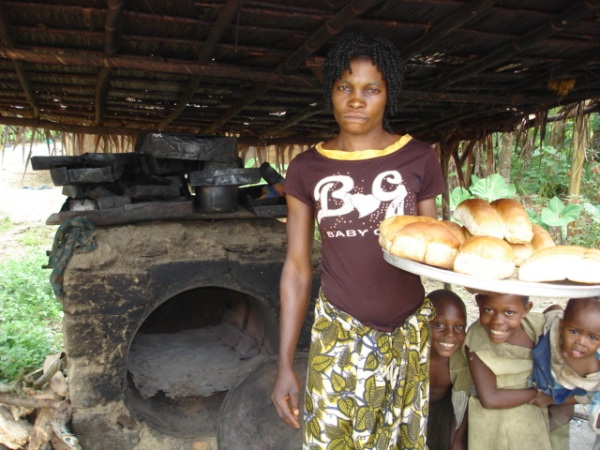 Paying her children's primary school fees is made possible by her bread sales at the Ikengo Saturday Market