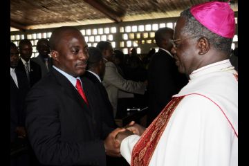 Cardinal Monsengwo was formerly Archbishop of Kisangani where he met Kabila in this Photo