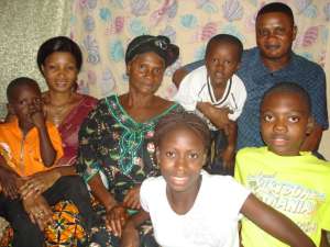 Dr. Eric Bosai of Monieka with family including mother